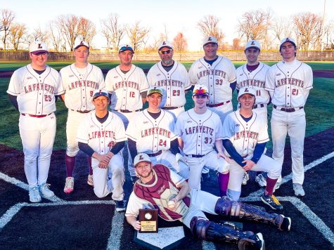 The club baseball team poses with its trophy after its championship game victory. (Photo courtesy of Ethan Kline 23)  