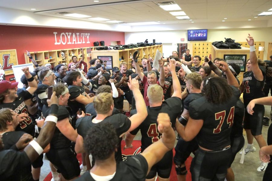 Coach John Troxell celebrates with his team following its last second win over Sacred Heart. 
(Photo courtesy of GoLeopards)