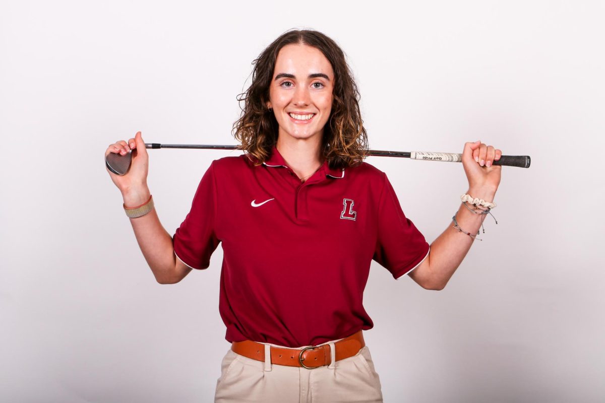 Junior Grace Sanborn poses with one of her clubs.
(Photo courtesy of GoLeopards)