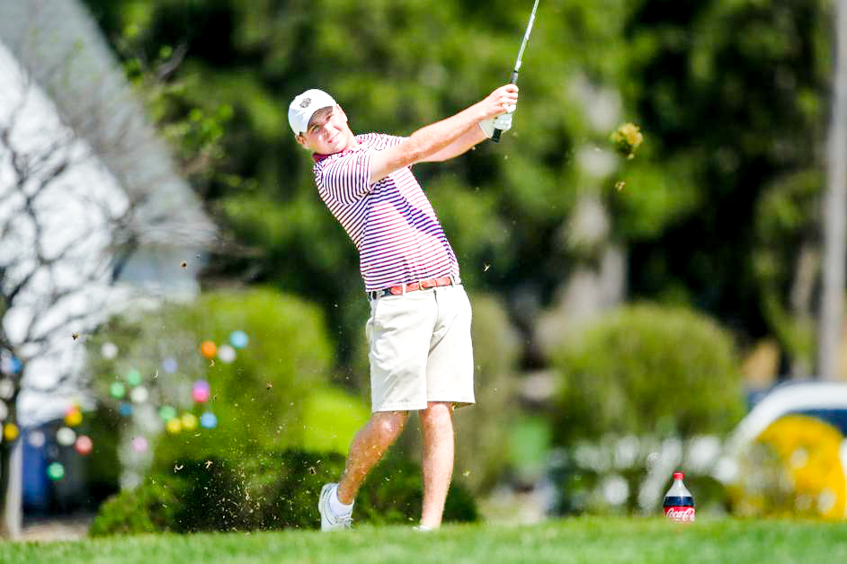 Sophomore Harry Dessel tees off. (Photo courtesy of GoLeopards)