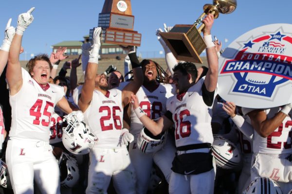The football team celebrates its commanding victory over Lehigh. (Photo by Rick Smith for GoLeopards)
