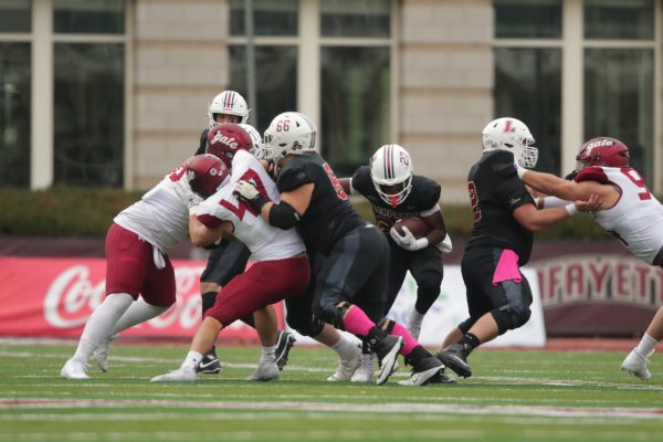 Freshman Troy Bruce carries the ball during the Leopards overtime loss to Colgate. (Photo by Rick Smith for GoLeopards)