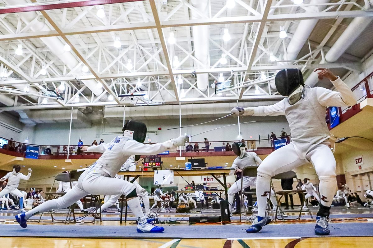 The fencing team practices at 6 a.m. due to facility conflicts. (Photo by Rick Smith for GoLeopards)
