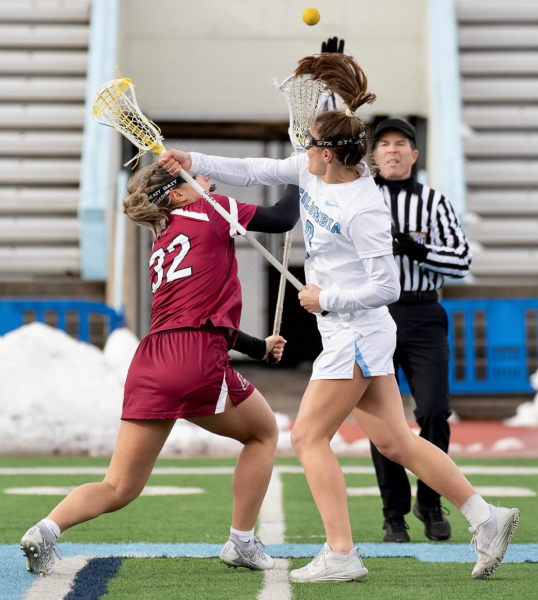 Sophomore Kate Marrs takes a face-off against Columbia. (Photo courtesy of @culionslax on Instagram)