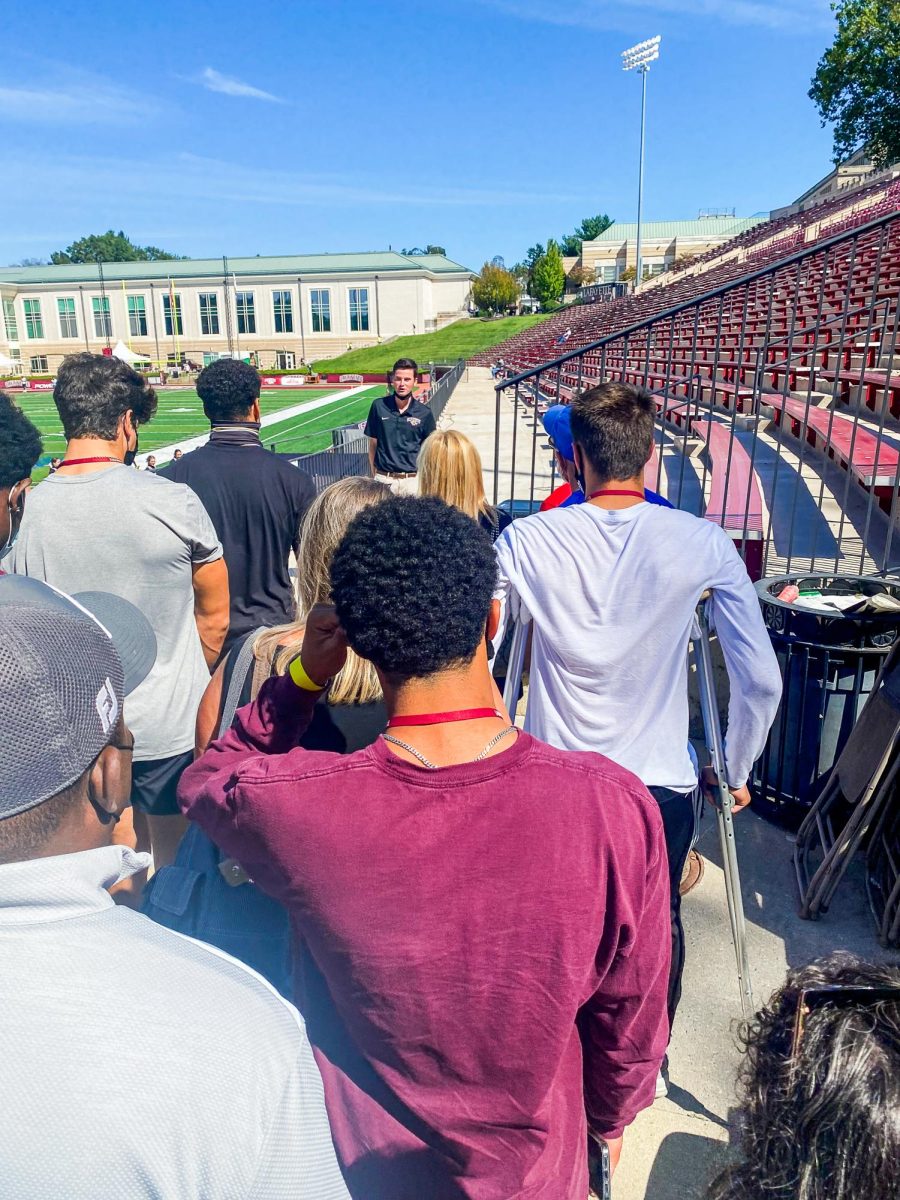 Football recruits go on a campus tour during an official visit. (Photo courtesy of Betsy Berman)