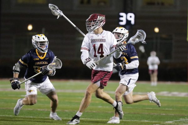 Senior attacker Peter Lehman heads towards the goal. (Photo by Rick Smith for GoLeopards)