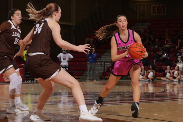 Junior guard Abby Antognoli dishes the ball during the Leopards loss to Lehigh over the weekend. (Photo by Rick Smith for GoLeopards)