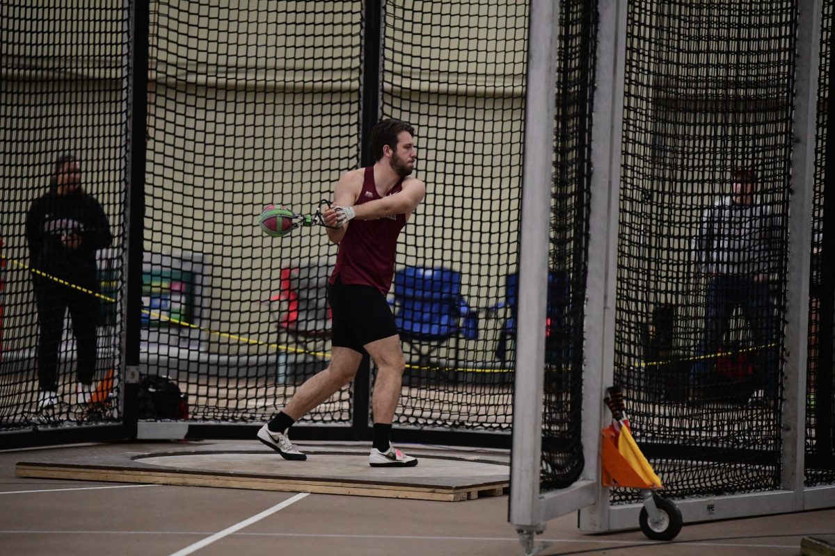 Senior Andrew Bowsher rears up at an indoor meet earlier this year. (Photo by Hannah Ally for GoLeopards)
