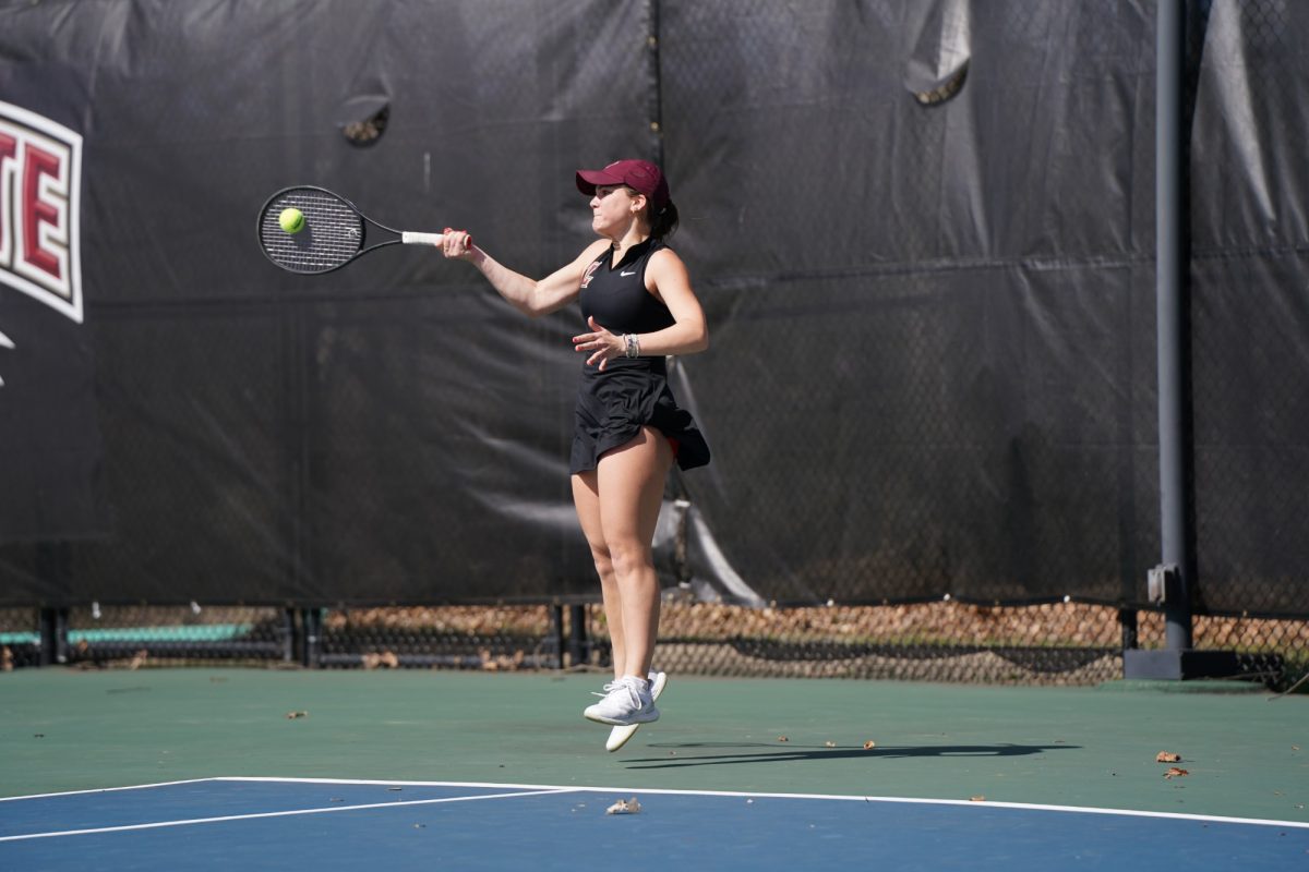 Sophomore Carmen Merkel rockets a forehand during the Leopards win over Fairfield University. (Photo by Trent Weaver for GoLeopards)