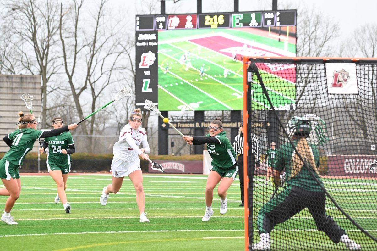 Junior attack Haleigh Albrecht launches a shot on goal against Eastern Michigan University on March 9. (Photo by George Varkanis for GoLeopards)