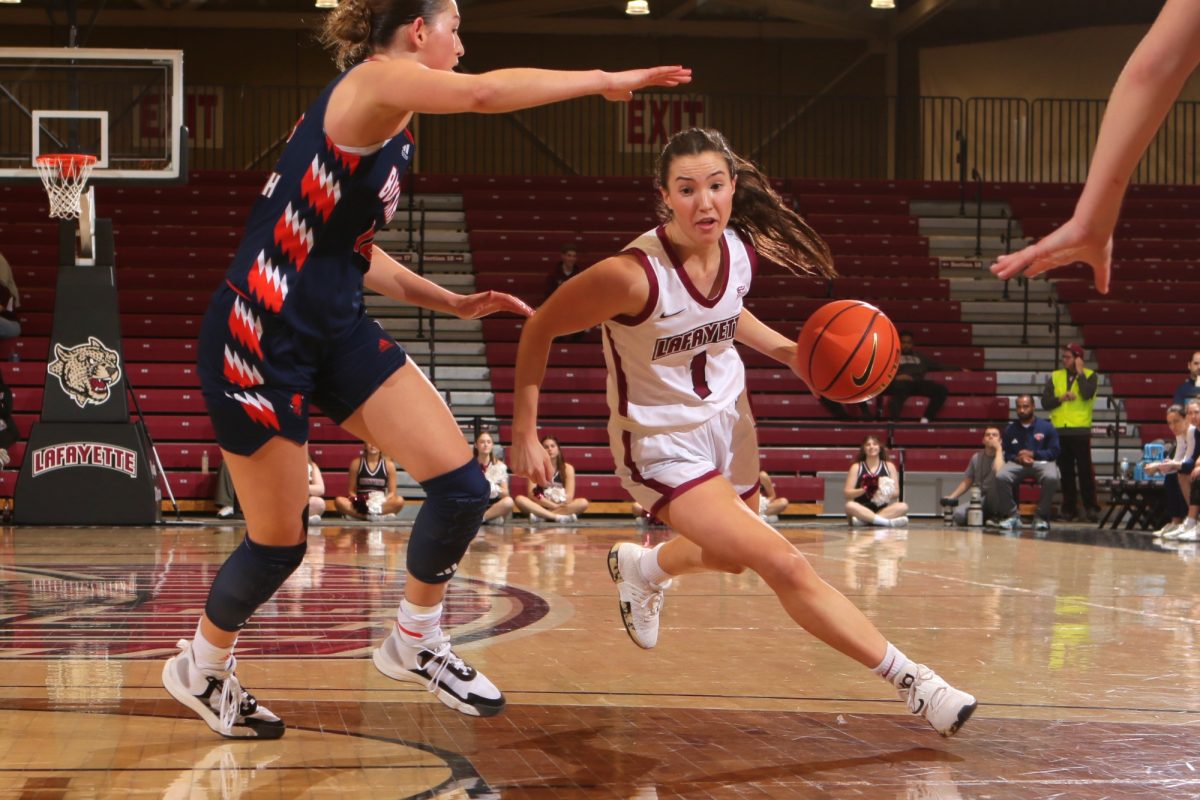 Junior+guard+Abby+Antognoli+drives+past+a+defender+during+the+loss+to+Bucknell.+%28Photo+by+Rick+Smith+for+GoLeopards%29