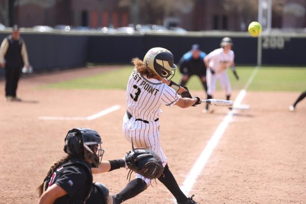 Junior catcher Maggie Klug crouches behind the plate against Army. (Photo courtesy of Army Athletics)