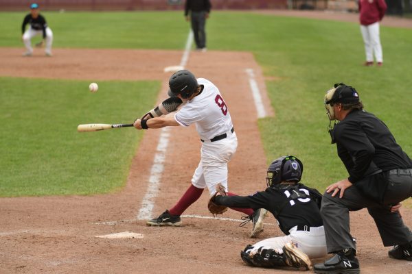 Freshman outfielder Teddy Cashman makes contact with a pitch. (Photo by Hannah Ally for GoLeopards)