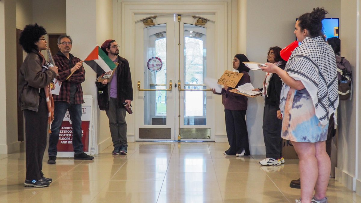 The pro-Palestine protest on April 19 began on the steps of Farinon College Center and eventually moved to Markle Hall.