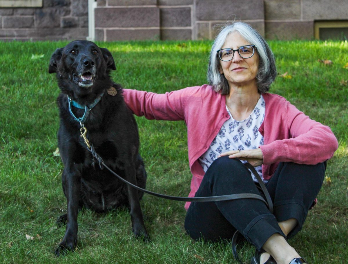 Maria (left), a mixed breed, is a friendly face in the English department. 