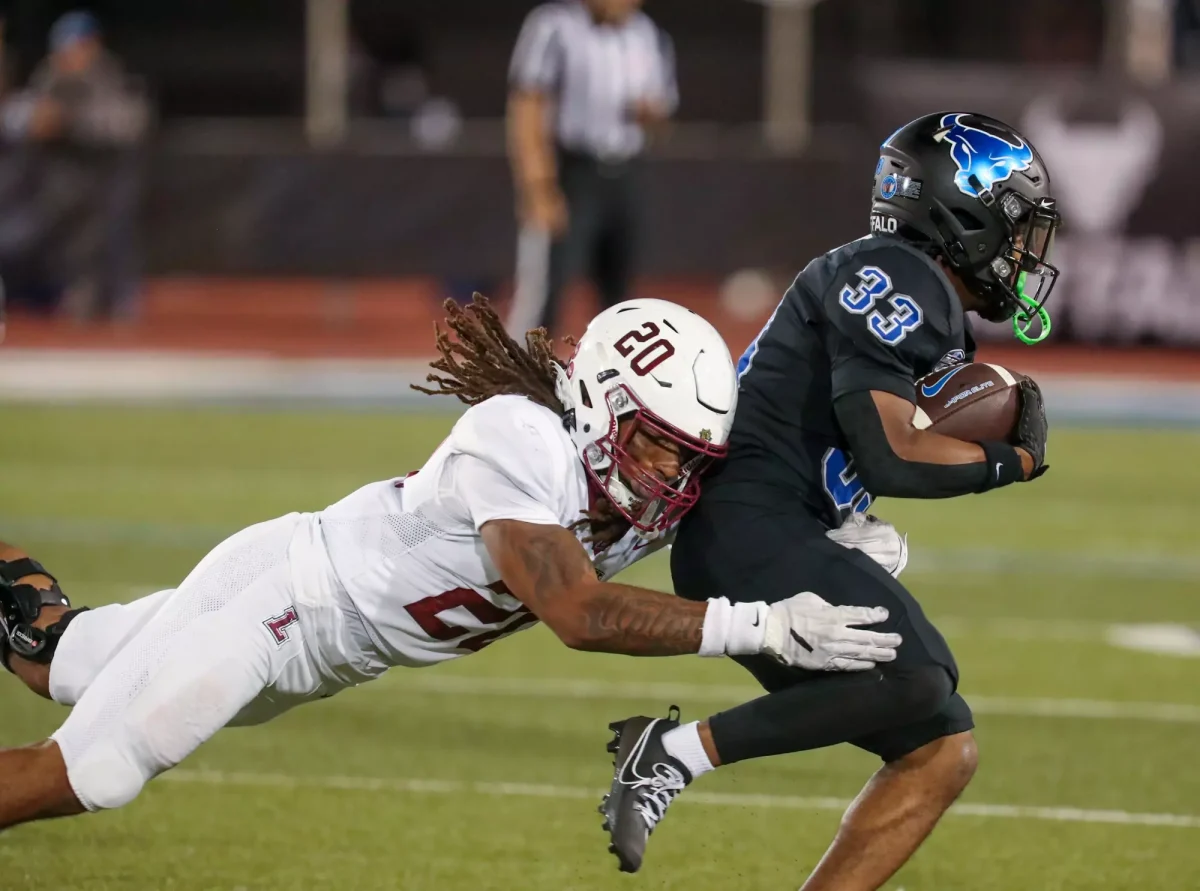 Sophomore linebacker Robert Stevens tries to tackle a Buffalo player in the Leopards' Thursday loss. (Photo by Nicholas T. LoVerde for GoLeopards)