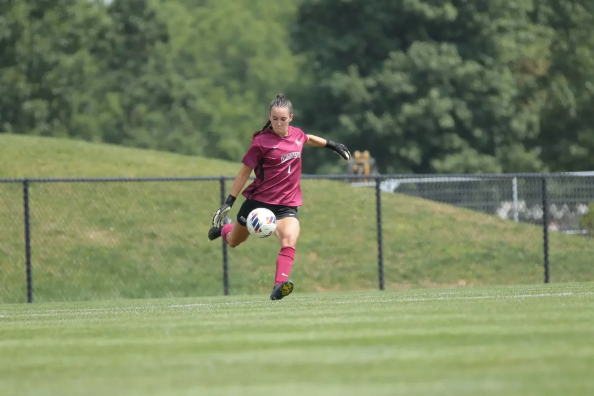 Sophomore goalkeeper Catherine Apker punts the ball against Siena College on Aug. 15. (Photo by Rick Smith for GoLeopards)