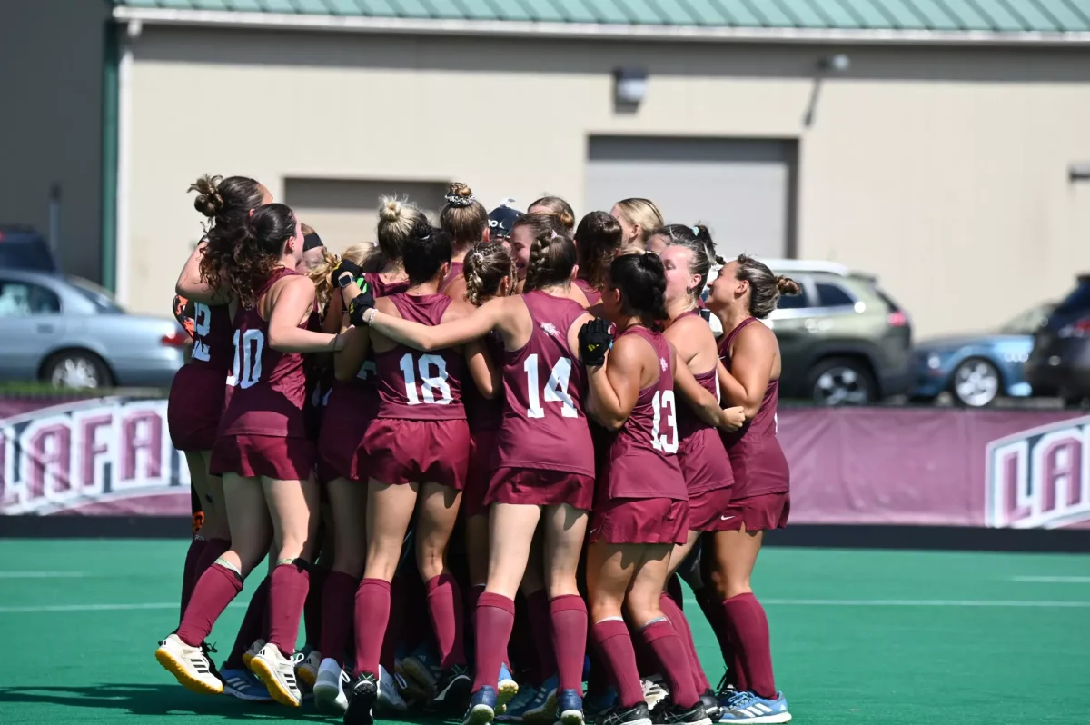 The field hockey team celebrates following Sunday's win against Delaware. (Photo by George Varkanis for GoLeopards) 