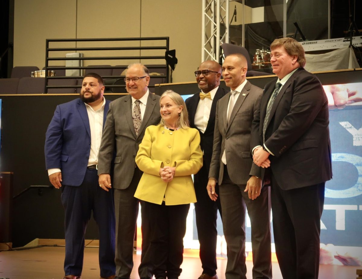 Elected officials, including House Minority Leader Hakeem Jeffries and U.S. Rep. Susan Wild pose after the roundtable discussion in Easton. 