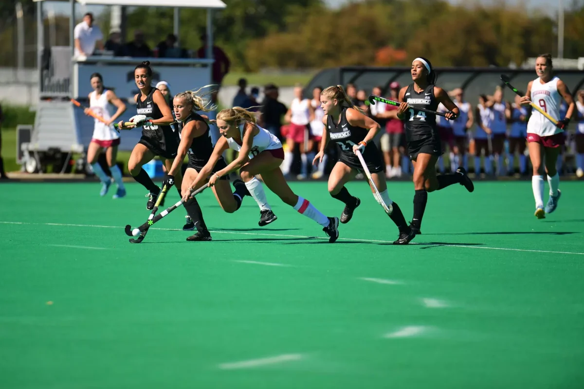 Senior forward Lineke Spaans battles with several Providence defenders for the ball in Sunday's home win. (Photo by Hannah Ally for GoLeopards)