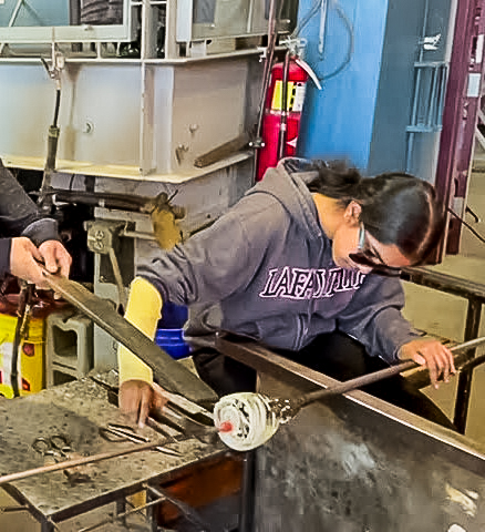 Swetha Tadisina '25 began her glassblowing journey two years ago. (Photo courtesy of Swetha Tadisina '25) 