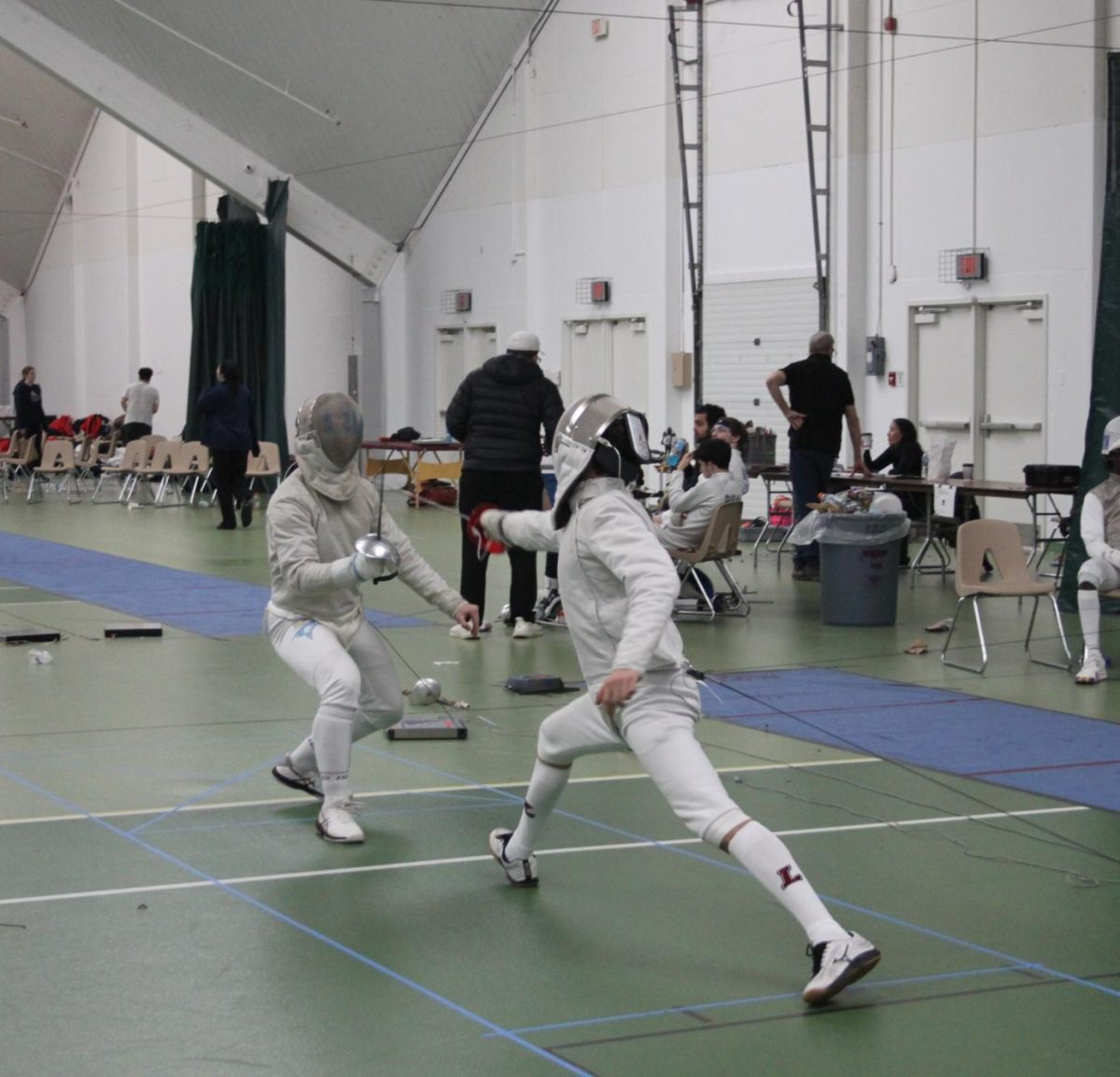 Freshman sabre Nikita Kogan racked up 12 wins at the Vassar Invitational on Sunday. (Photo courtesy of Anna Silver '25)