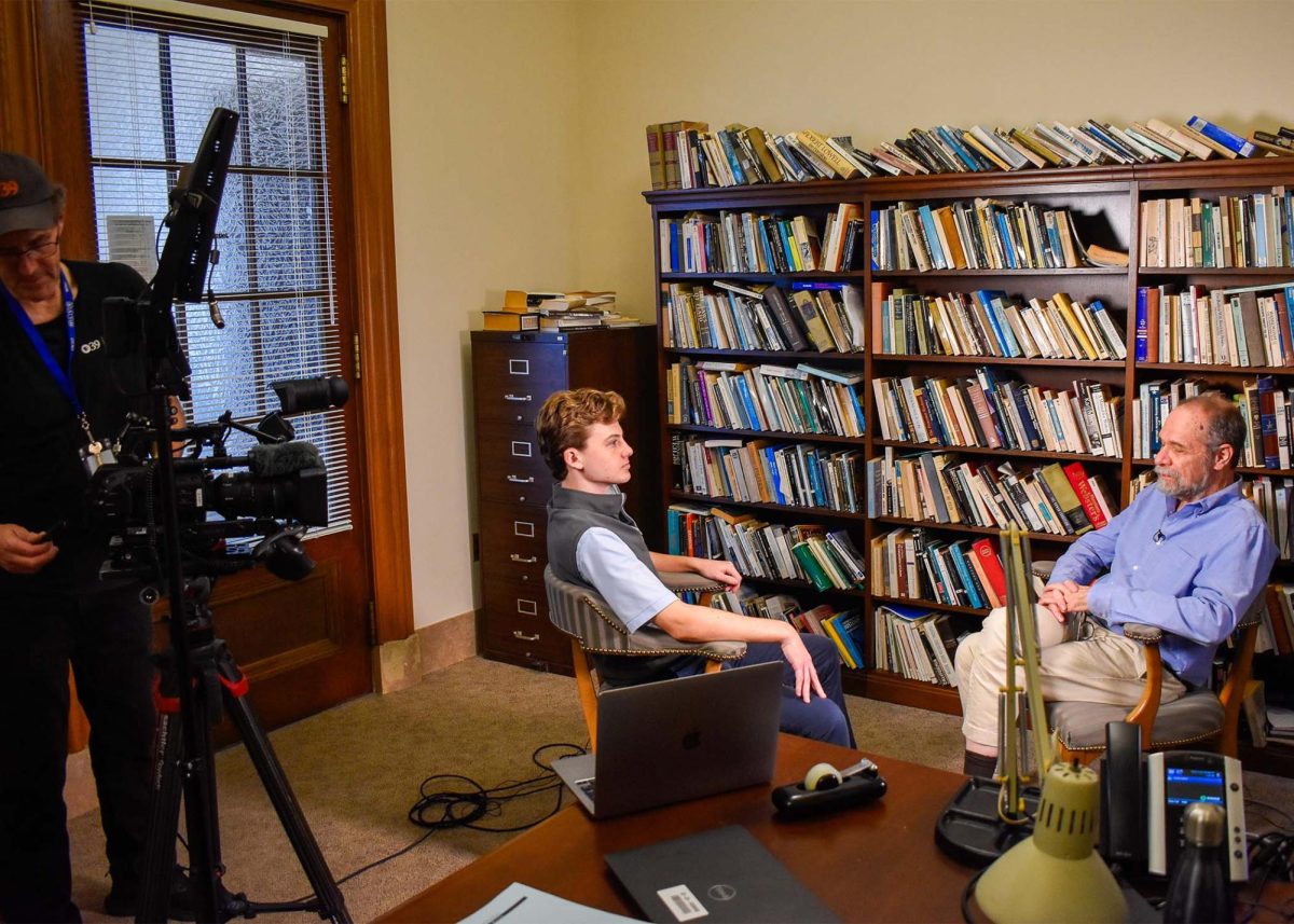 Nate Rashkind '26 interviews Government & Law Professor Joshua Miller for a segment of the broadcast.