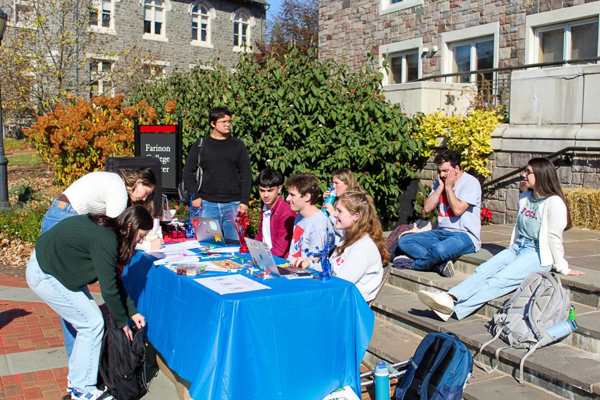 Students sign up to get donuts at an Election Day sponsored by Lafayette Votes.