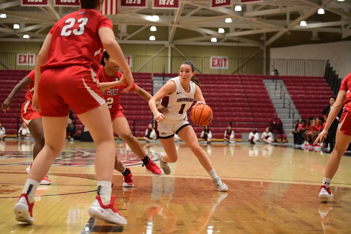 Senior guard Abby Antognoli drives to the basket against Saint Francis University. (Photo by Hannah Ally for GoLeopards)