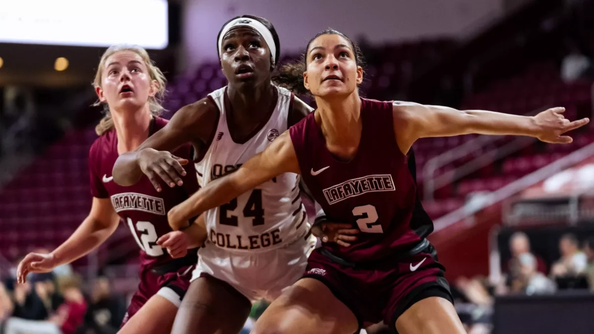 Sophomore guard Teresa Kiewiet and junior forward Emma Shields fight for positioning on a rebound against Boston College on Monday. (Photo by Meg Kelly for GoLeopards)