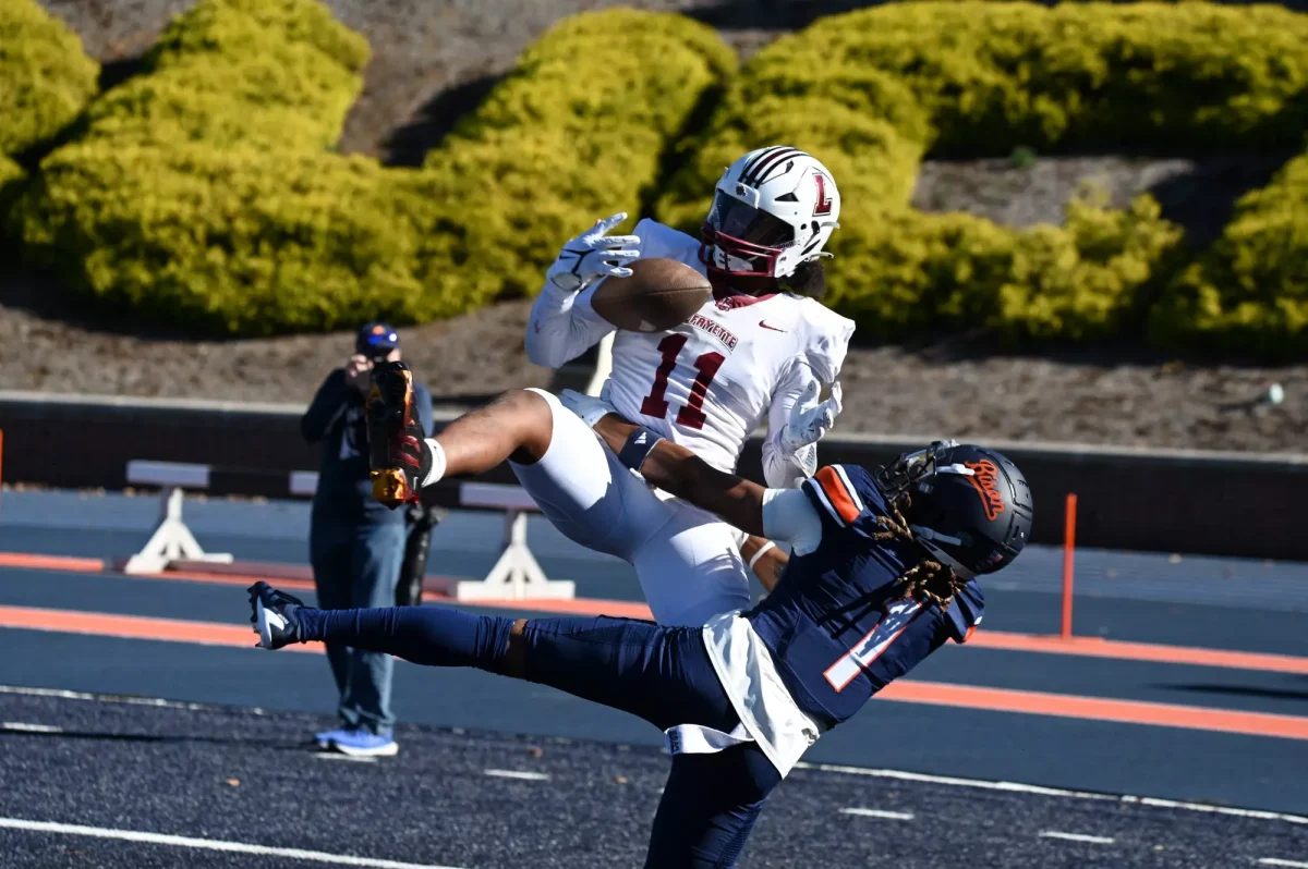 Senior defensive back Saiku White snatches a one-handed interception against Bucknell University last Saturday. (Photo by George Varkanis for GoLeopards)