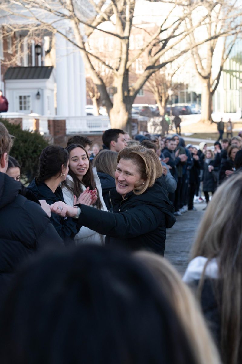 College President Nicole Hurd greets supporters before Tuesday's faculty meeting.