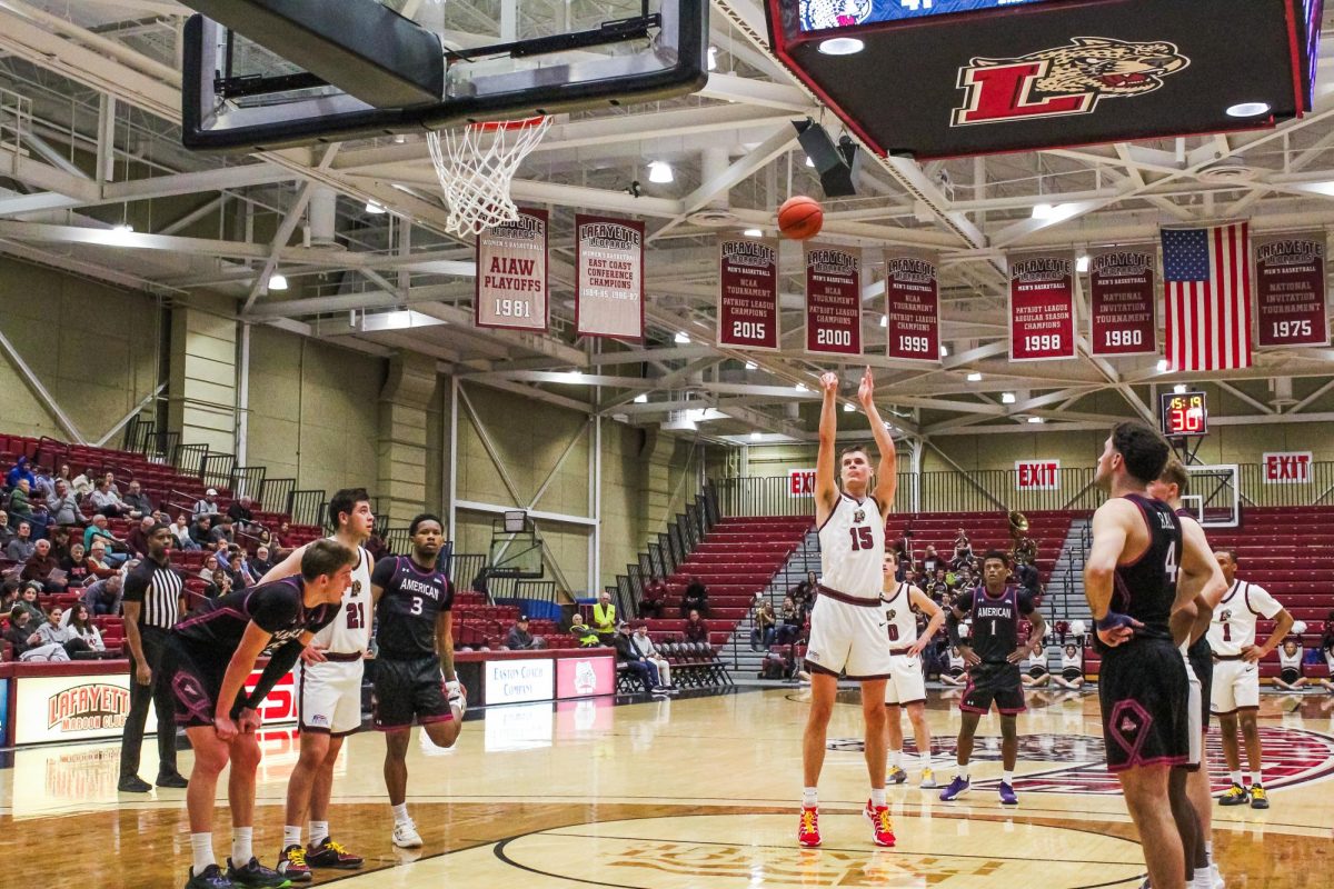 Senior center Justin Vander Baan releases a free throw in the men's basketball team's close loss to American on Wednesday night. 