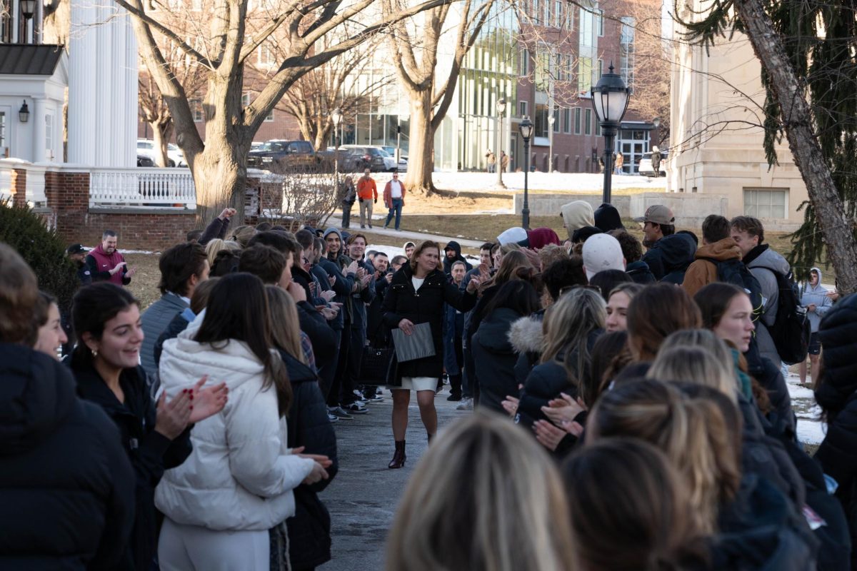 College President Nicole Hurd greets supporters before Tuesday's faculty meeting.