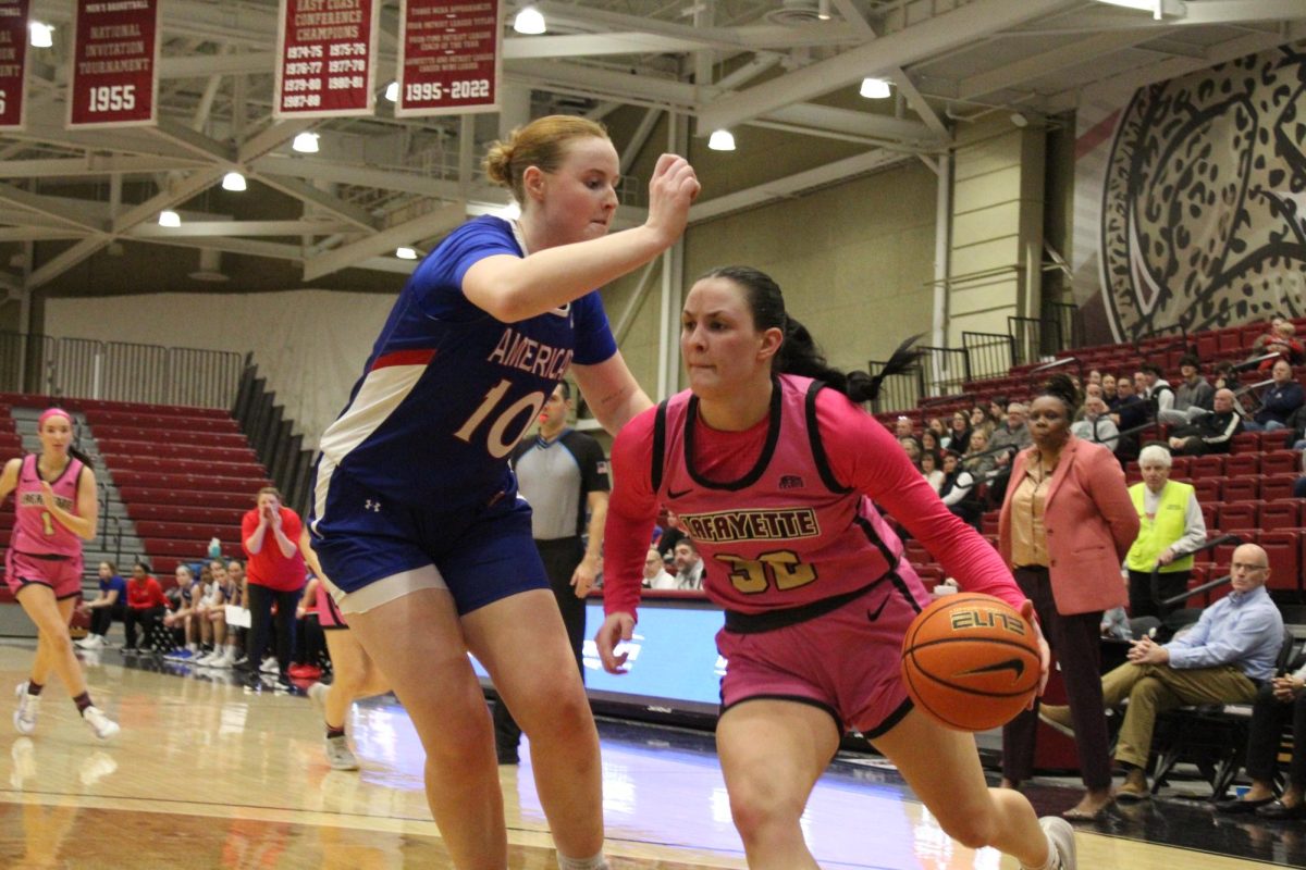 Senior guard Halee Smith looks to attack the basket against American University on Wednesday night. (Photo by Austin Carey '27)