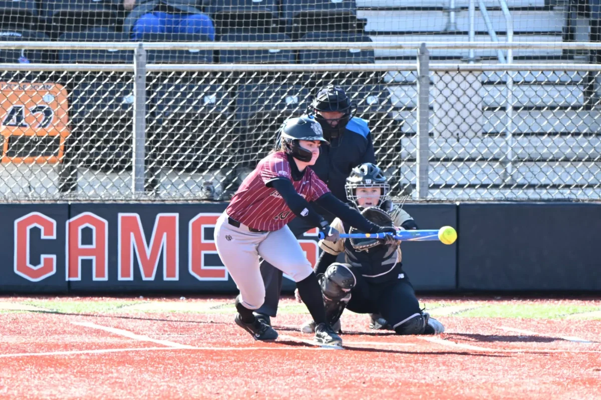 Senior outfielder Mary Grace O'Neill reaches for a pitch against Campbell University on Friday. (Photo courtesy of GoLeopards)