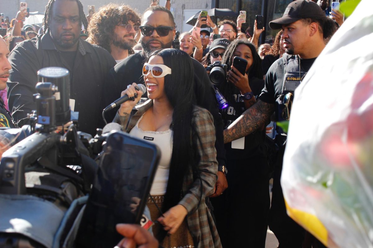 Cardi B arrived at Palmer Park Mall in a Cadillac Escalade, with several decoy Escalades preceding her actual entrance.