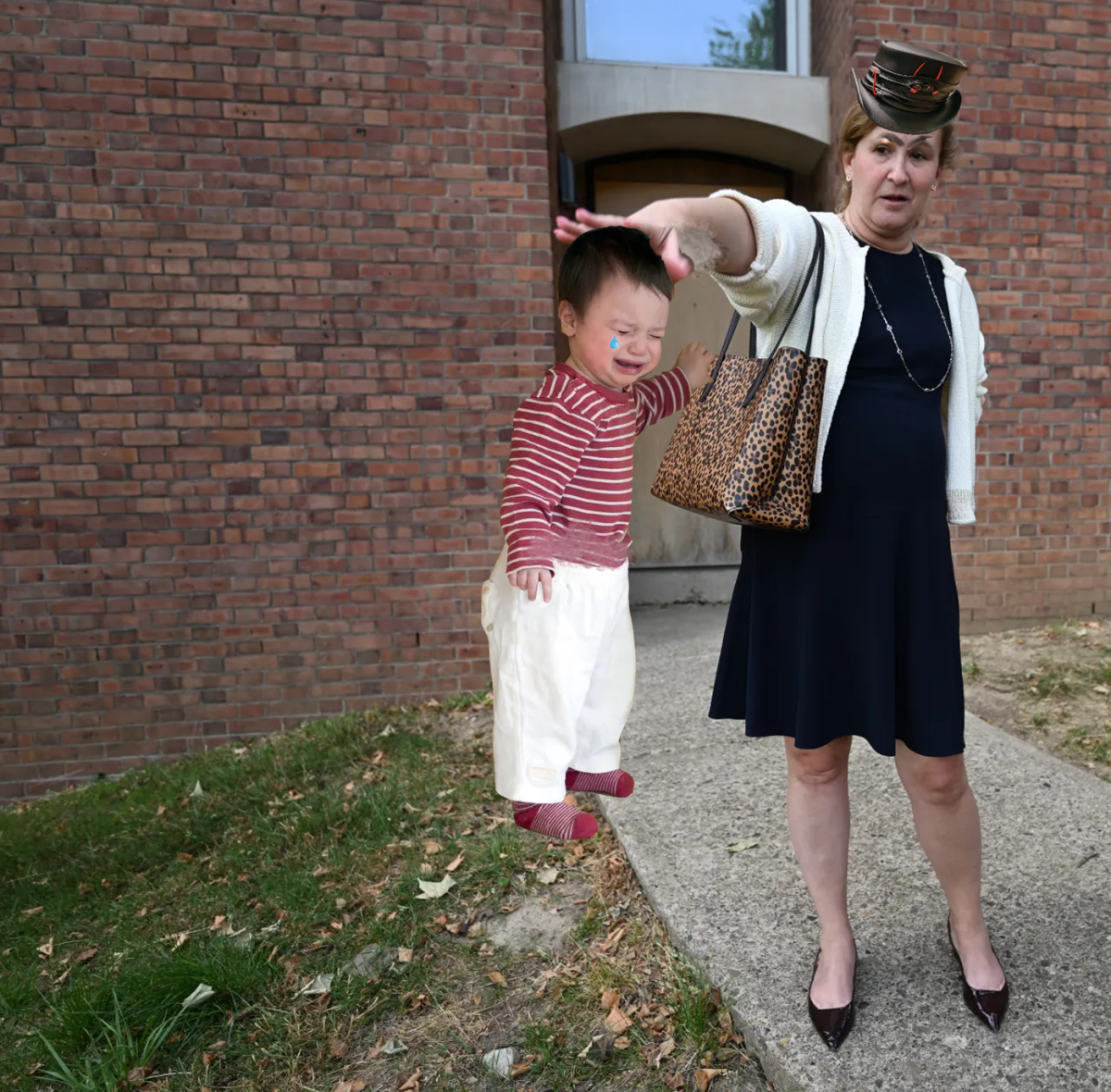 College President Nicole Hurd reprimands a child.