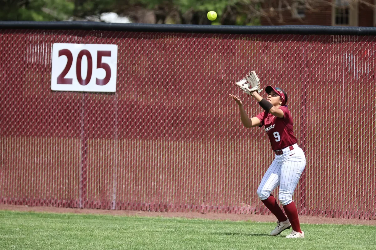 Freshman outfielder Ava Butler catches a fly ball. (Photo by Rick Smith for GoLeopards)