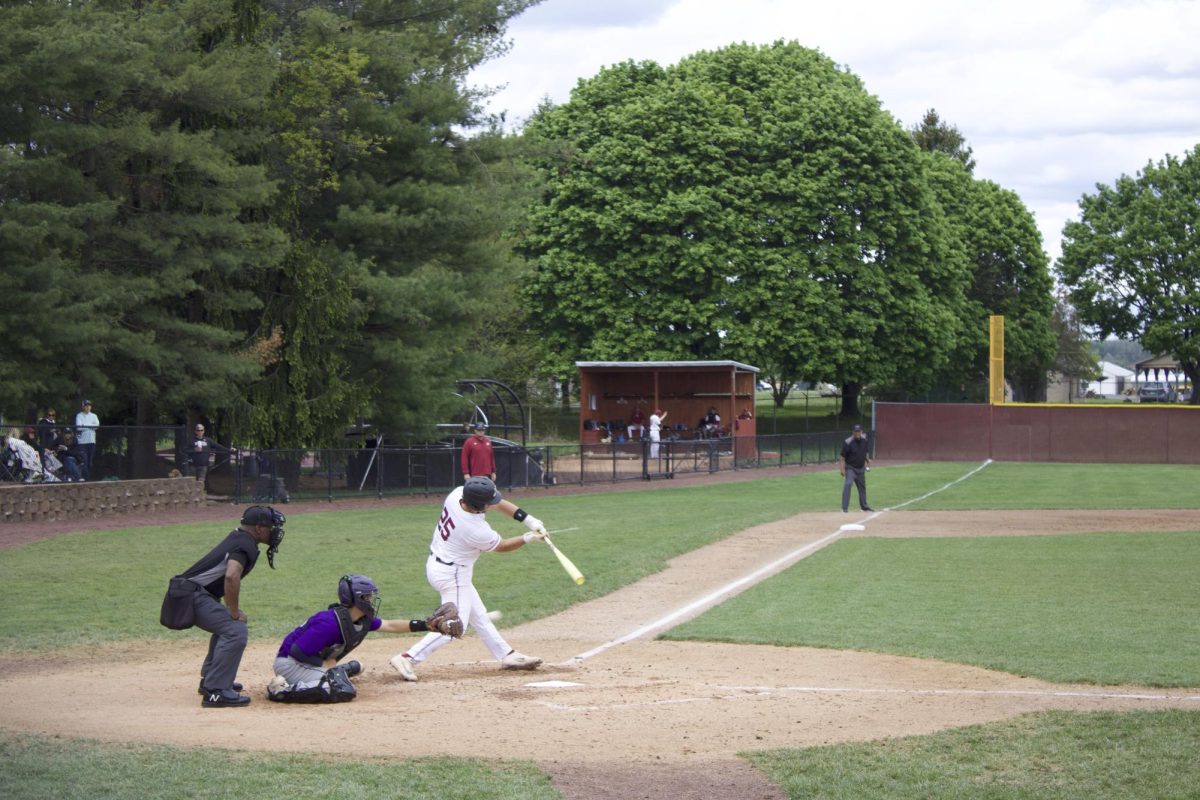Junior catcher Brandon Doubek at the dish against Holy Cross.