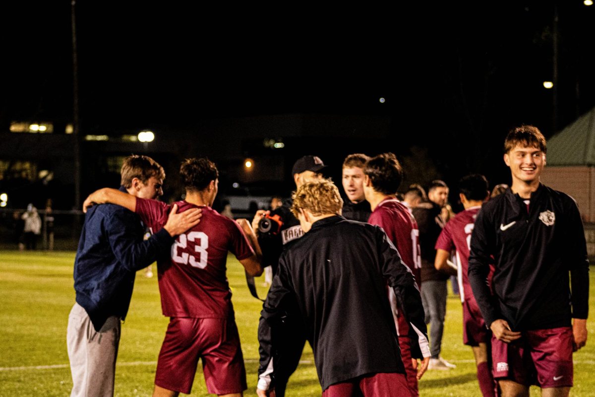 The men’s soccer team celebrating after winning the Patriot League championship over Lehigh University.